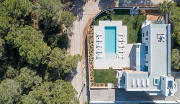 Resa estate modern villa for sale ibiza first line north air photo.jpg